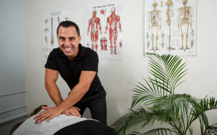 North Ryde Chiropractor Dr Angelo Marketos treating a patient with back pain at Ryde Natural Health Clinic