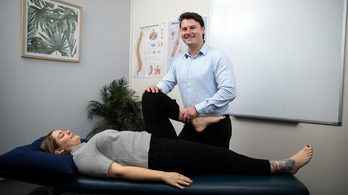 North Ryde Physiotherapist Dominic Fitzgerald treating back pain 1170x658