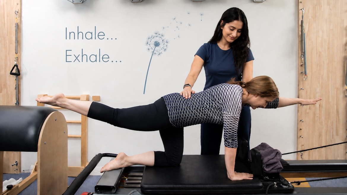 Sydney Physiotherapist Brinda Charola teraching Pilates in North Ryde at Ryde Natural Health Clinic